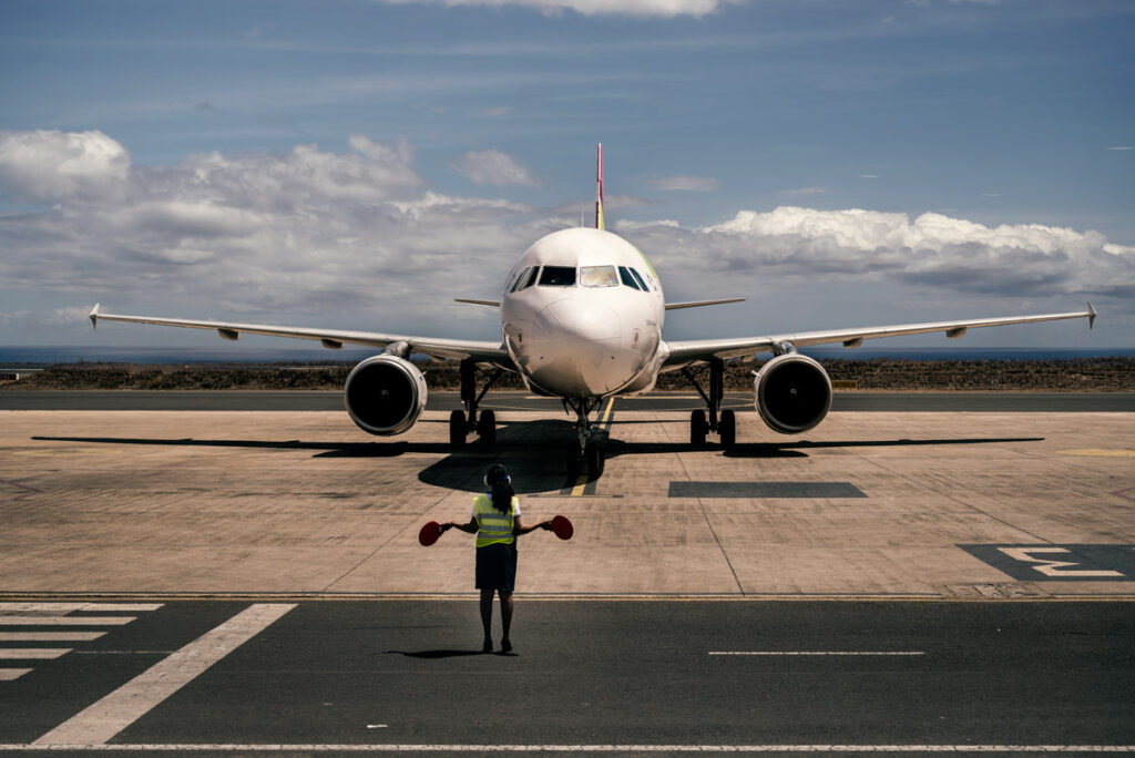 Flight controller in front of an airplane