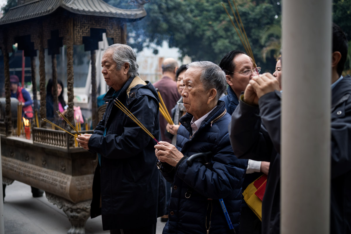 Men Praying in Macau